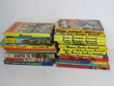 A quantity of Lone Ranger Annuals, Sooty Annuals, and other various books similar.