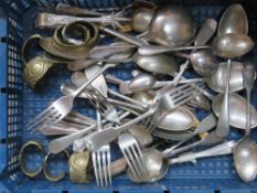 A quantity of assorted cutlery including set of brass napkin rings.