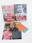 Two autographed John Challis books together with an autographed photograph and ticket stub.