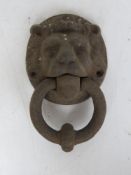 A cast iron Lion head door knocker