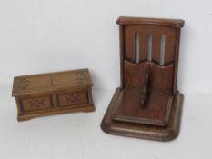 An oak desk top letter holder together with a music box by Tallent of Old Bond Street London.