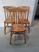 A set of three dining chairs, naive restoration noted.
