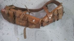 A WWI Belgian leather bandolier. This lot will be available to collect in person 48 hours after