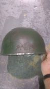 A British Cold War era Paratrooper helmet. This lot will be available to collect in person 48