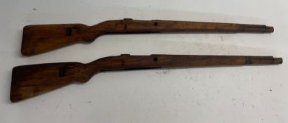 Two WWII German K98 wooden rifle stocks. This lot will be available to collect in person 48 hours