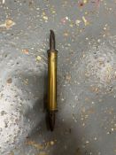 A British Army Vickers recoil spring gauge, together with a WWI Vickers Gunners pouch dated 1915.