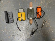 A quantity of survival kit items including torch, distress beacon, whistle, pen, hunting knife,