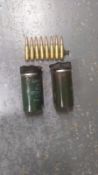Two inert British L132 smoke grenades, together with eight inert 7.62 NATO rounds in link. This
