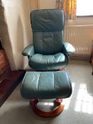 An Ekornes of Norway green leather Stressless reclining chair and stool,