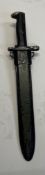 A US M1 Garand rifle bayonet and scabbard.