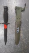 A US M1 bayonet and scabbard.