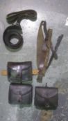 Three leather WWI French Lebel ammo pouches, with various straps.