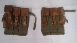 A pair of WWII German MP44 magazine pouc