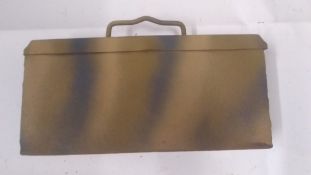 A repainted WWII German ammo tin. Thi