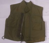 A US armour vest. This lot will be av