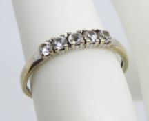 A 9ct gold five stone ring, hallmarked 375, size K-L, 1.1g.