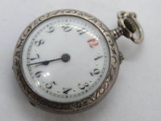 A silver fob watch having white enamel dial, import hallmark, Swiss movement, total weight 24.5g.