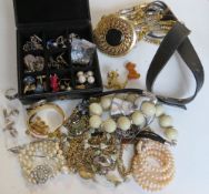 A quantity of assorted costume jewellery including cufflinks, bangle, 1980s belt, etc.