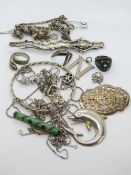 A quantity of assorted silver and white metal jewellery including brooches, rings, chains, etc.