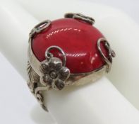 A filigree style silver and red stone boho ring, stamped 925, size N.