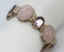 A substantial rose quartz bracelet, approx 22mm wide,