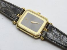 A ladies 18ct gold plated Raymond Weil wristwatch on original crocodile leather strap.