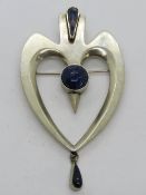 A 1960s Mexican silver brooch marked Tono (Tono Cecilia?) set with blue hardstones,