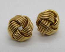A pair of 9ct gold knot stud earrings, hallmarked 375, 3.3g.