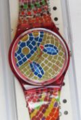 A Swatch watch in Ravenna pattern, original packaging, new battery within box.