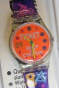 A Swatch watch in Coupon pattern 1992, original packaging.