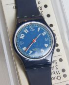 A Swatch watch in Forsail pattern, incorrect packaging, new battery within box.