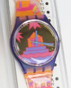 A Swatch watch in Rara Avis pattern, original packaging, new battery within box.