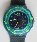A Scuba 200 Swatch watch in Blue Moon pattern, original packaging, new battery within box.