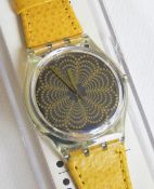 A Swatch watch in Daquiri pattern, original packaging, new battery within box.
