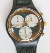 A Chrono Swatch watch in Rollerball pattern, incorrect packaging, new battery within bag.