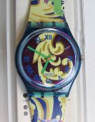 A Swatch watch in Perroquet pattern, original packaging, new battery within box.