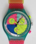 A Chrono Swatch watch in Flash Arrow pattern, original packaging, new battery within bag.