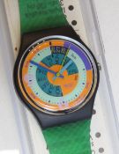 A Swatch watch in Skychart pattern, incorrect packaging, new battery within box.
