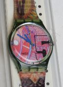 A Swatch watch in Franco pattern, original packaging, new battery within box.