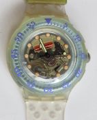 A Scuba 200 Swatch watch in Jelly Bubbles pattern, original packaging, new battery within box.