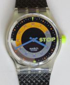 A Swatch Stop watch in Coffee Break pattern, original packaging, new battery within box.