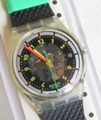 A Swatch watch in Black Line pattern, original packaging, new battery within box.