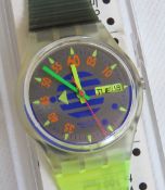A Swatch watch in High Pressure pattern, original packaging, new battery within box.
