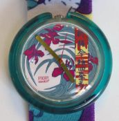 A limited edition Pop Swatch watch, Pleasure Garden, in original packaging, new battery within box.