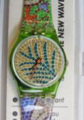 A Swatch watch in Byzanthium pattern 1990, original packaging, new battery within box.