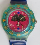 A Scuba 200 Swatch watch in Happy Fish pattern, original packaging, new battery within box.