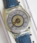 A Swatch watch in Delave pattern, original packaging, new battery within box.