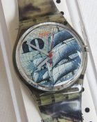 A Swatch watch in Mark pattern, original packaging, new battery within box.