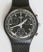 A Chrono Swatch watch in Black Friday pattern, original packaging, new battery within bag.