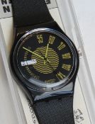 A Swatch watch in Broadcast pattern, incorrect packaging, new battery within box.